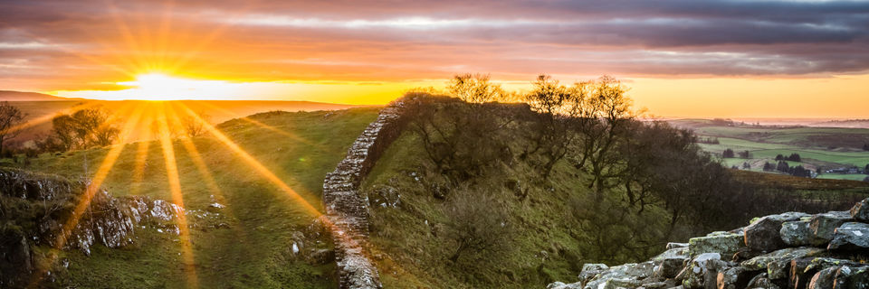 hadrian's wall at sunrise in nnorthumberland
