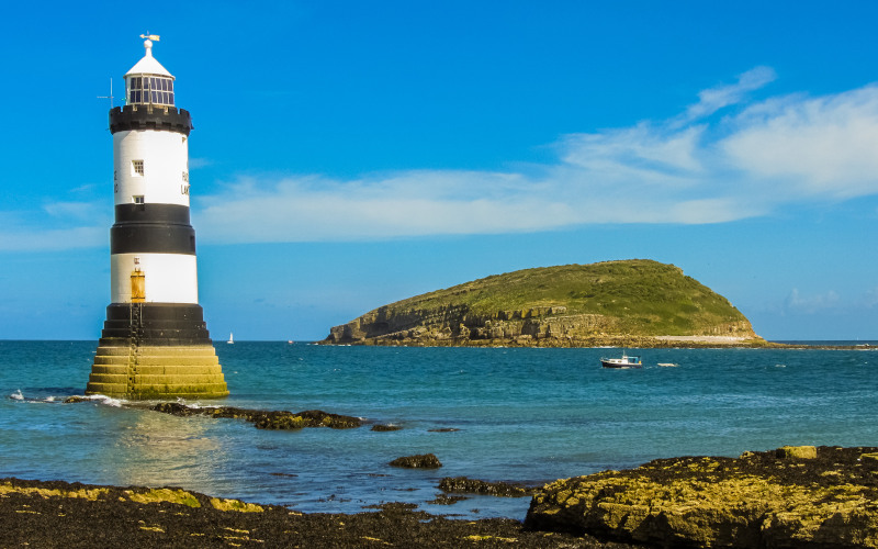 Trwyn Du lighthouse and Puffin Island trwyn du lighthouse with puffin ialand anglesey